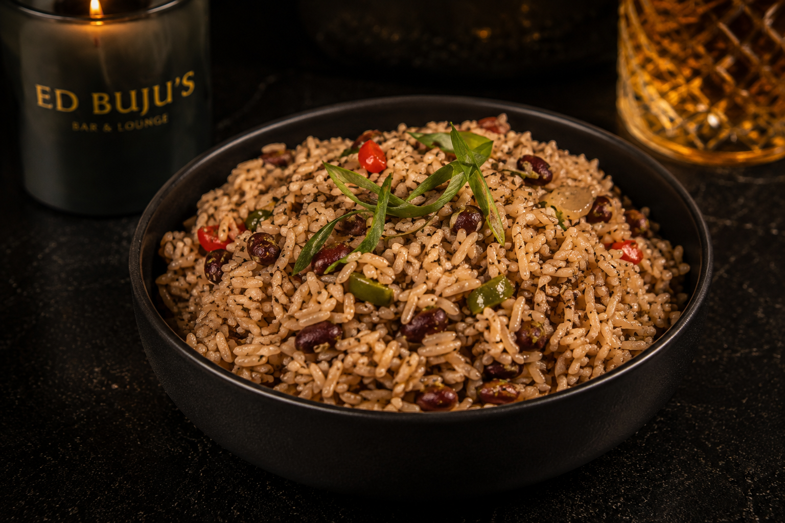 Bowl of rice and peas with scallion, chilli and kidney beans